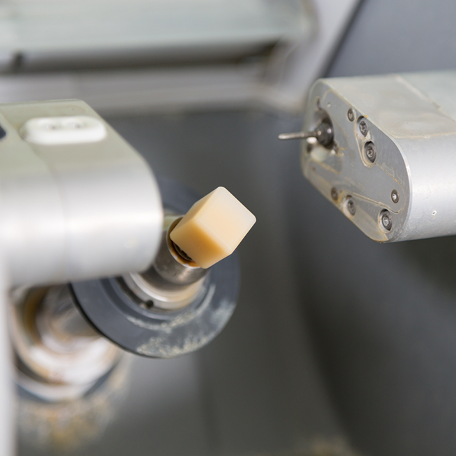 Close-up of ceramic block in CEREC machine